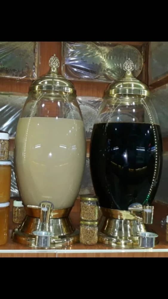 Tahin Bal Pekmez Musluklu Cam Fanus – 20 litre olarak belirtilen tahin, bal ve pekmez fanusu, yüksek şeffaf gövde ve ayaklı kaideye sahiptir